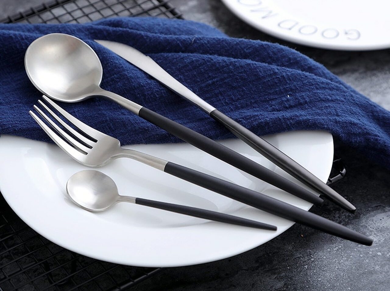 http://nordicabode.com/cdn/shop/collections/Luxury-Dinnerware-Set-Stainless-Steel-Plating-Gold-Blue-Black-Knife-Fork-Tableware-Cutlery-White-European-Western__83228.1544163311.jpg?v=1678418368