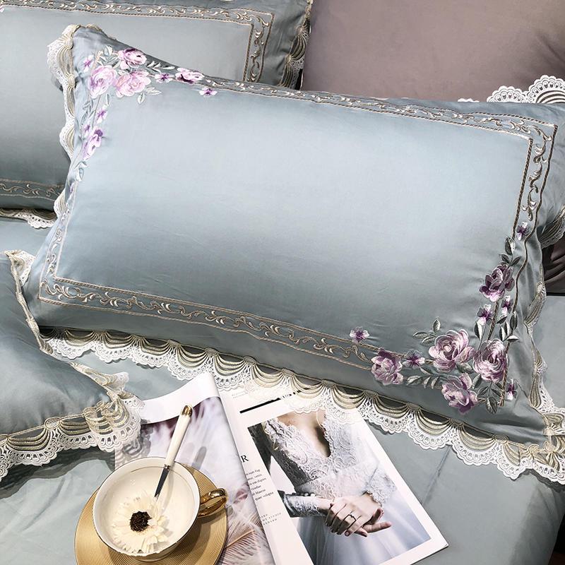 https://nordicabode.com/cdn/shop/products/Egyptian-cotton-Luxury-King-Queen-size-Bedding-Set-Embroidery-duvet-covers-Classical-Blue-Pink-Bed-cover_6eebab44-1f06-445f-9aea-0f1180555d8f_1445x.jpg?v=1674824436