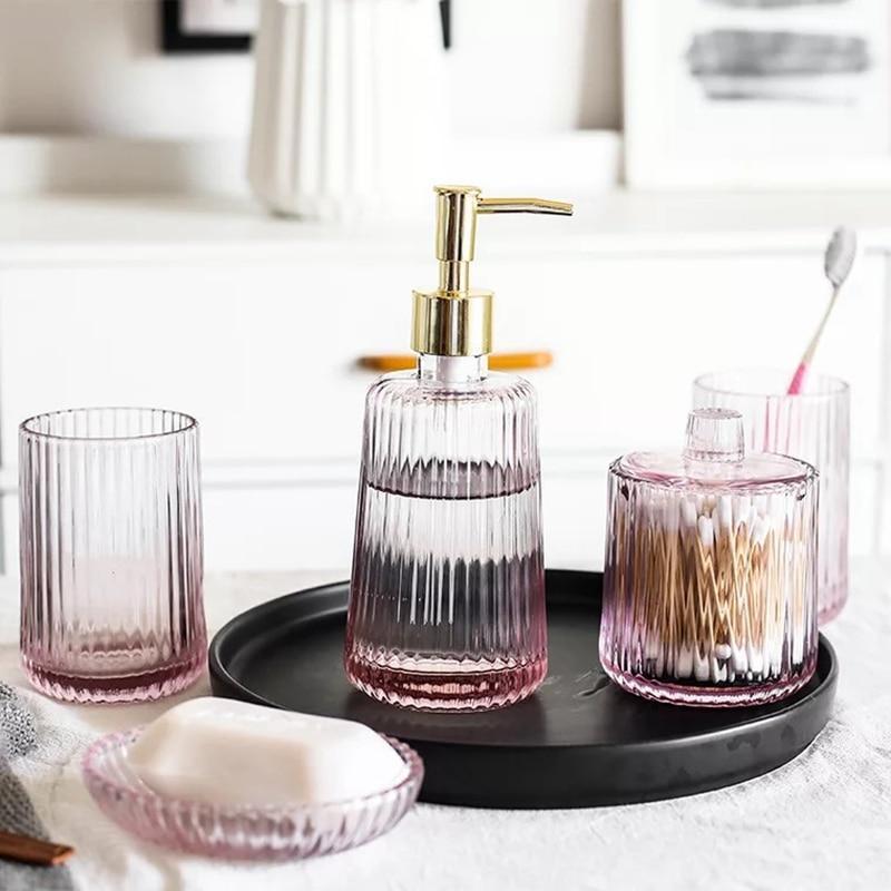 https://nordicabode.com/cdn/shop/products/Ins-Transparant-pink-glass-bathroom-set-fashion-household-wash-cup-bathroom-supplies-kit-toothbrush-holder-set_f20a14ed-da6d-4861-b74a-248d0d874206_1445x.jpg?v=1674905720